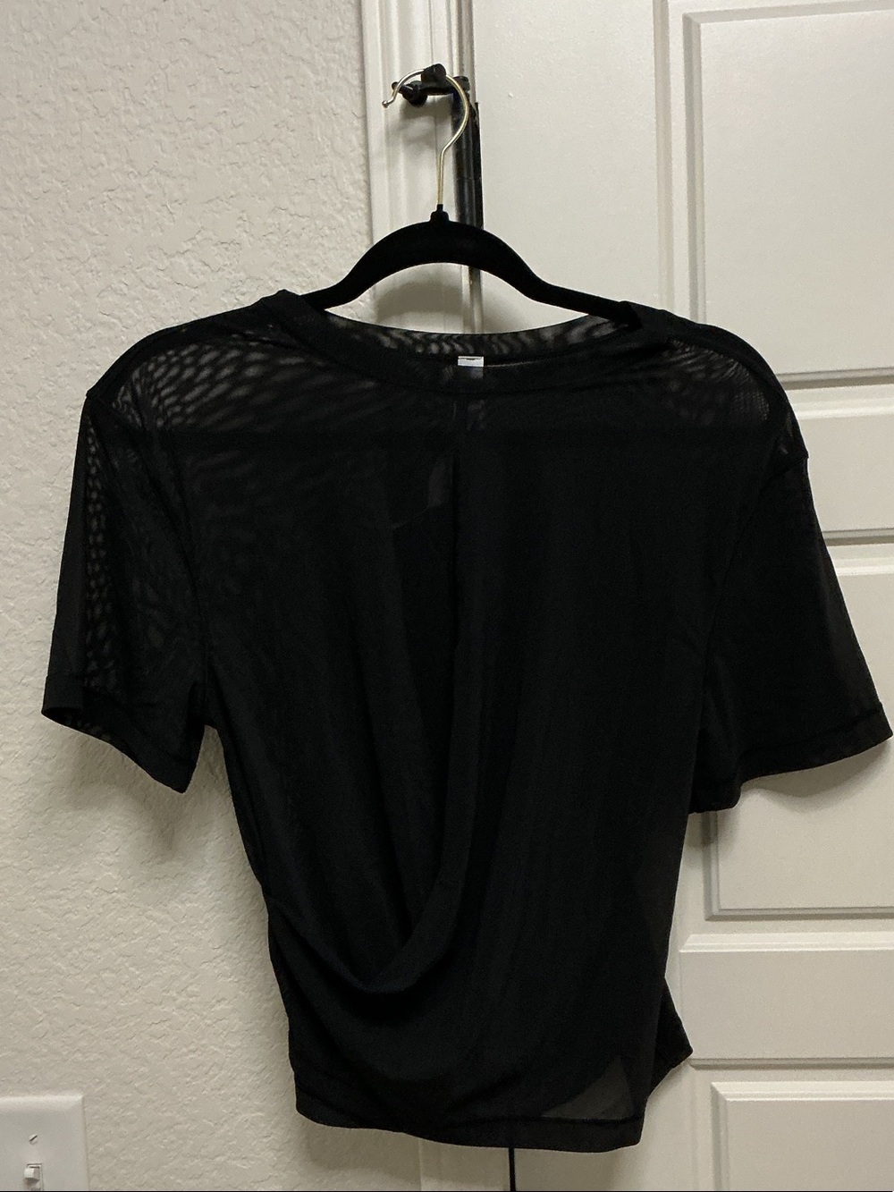 lululemon athletica Black Sheer twist on front Mesh Short Sleeve Top, Size 6